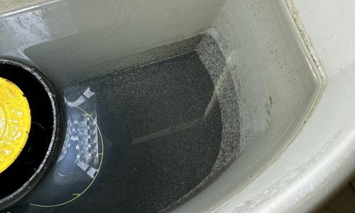 Black Sediment in Toilet Bowl